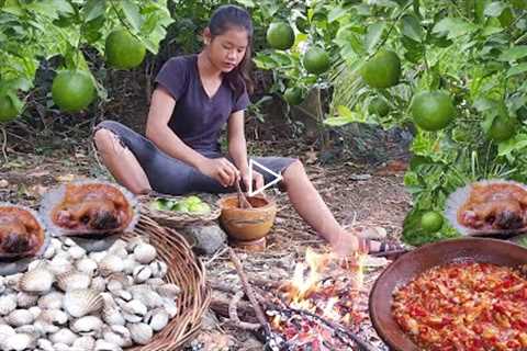 Shells grilled in the ground and Natural orange for food in jungle - Survival cooking in forest